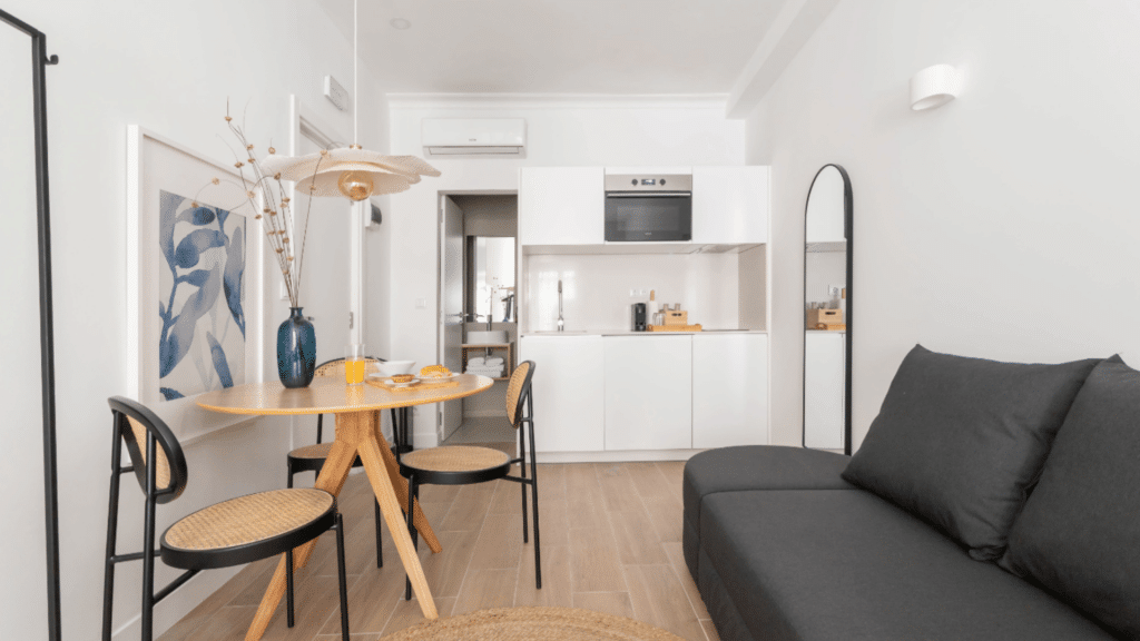 Kitchen and dining area inside private Lisbon studio residence