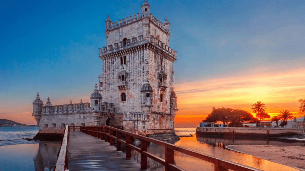Belém Tower at sunset along the Tagus River in Lisbon